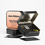 Open tin of Inner Balance Hair, Skin & Nails Strips showing individual fast-dissolving strips