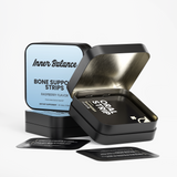 Open tin of Inner Balance Bone Support Strips showing individual fast-dissolving strips